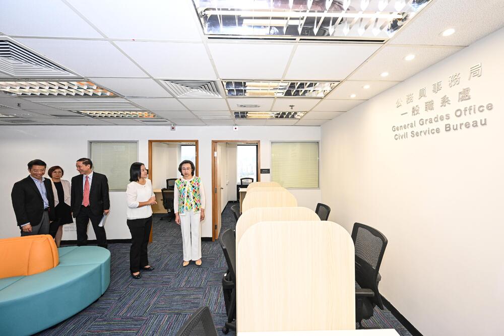 Ingrid Yeung, far right, inspects the recruitment center. Ingrid Yeung, far right, inspects the recruitment center.