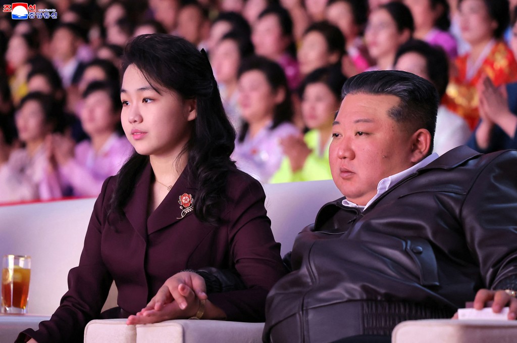 Photo by STR / KCNA VIA KNS / AFP This picture taken on March 8, 2026 and released by North Korea's official Korean Central News Agency (KCNA) on March 9, 2026 shows North Korean leader Kim Jong Un (R) and his daughter Kim Ju Ae (L) watching a performance commemorating International Women's Day at the Pyongyang Gymnasium.