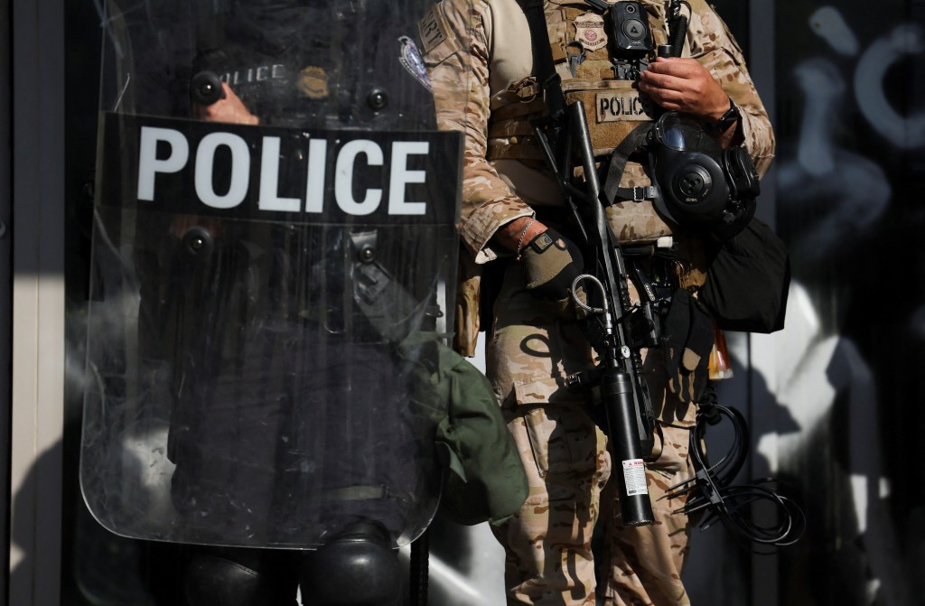 Members of law enforcement stand guard during a protest against federal immigration sweeps in downtown Los Angeles, California, U.S. June 10, 2025. (Reuters)