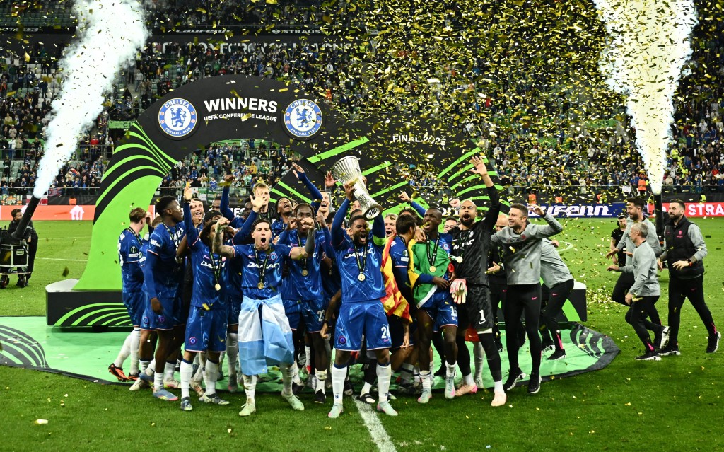 Chelsea's Reece James lifts the trophy as he celebrates with teammates after winning the Conference League. (Reuters)