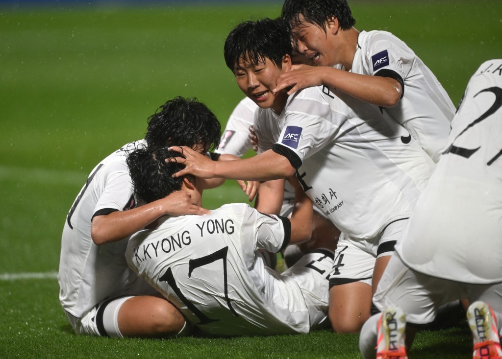 Kim Kyong Yong (2nd L #17) of Naegohyang Women's FC celebrates scoring her team's second goal with teammates during the AFC Women's Champions League semi-final football match between North Korea's Naegohyang Women's FC and South Korea's Suwon FC Women in Suwon on May 20, 2026. (Photo by Jung Yeon-je / AFP)