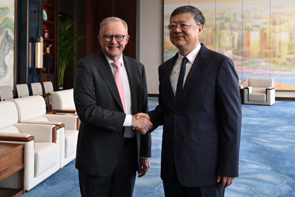 Australia's Prime Minister Anthony Albanese shakes hands with Shanghai Party Secretary Chen Jining during a meeting, in Shanghai, China, July 13, 2025. (Reuters)