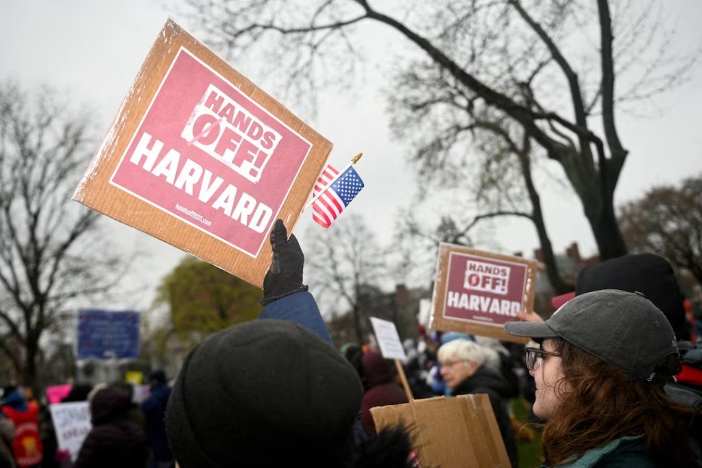 Demonstrators rally on Cambridge Common in a protest organized by the City of Cambridge calling on Harvard leadership to resist federal government interference at the university in Cambridge, Massachusetts, U.S. April 12, 2025. REUTERS/Nicholas Pfosi/File Photo 
