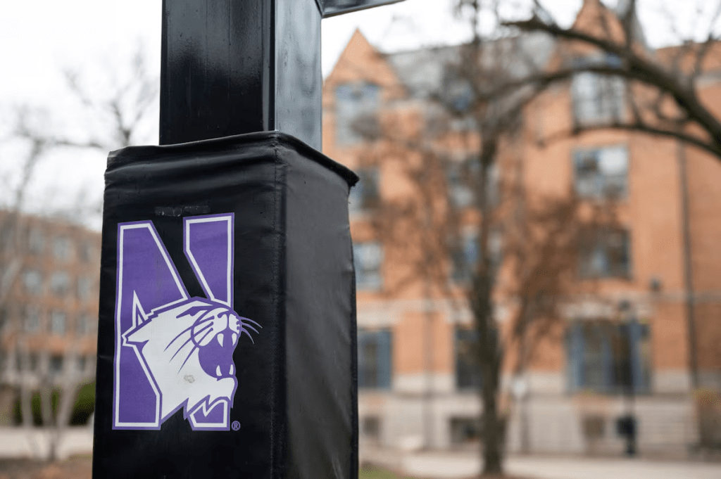 The Northwestern Wildcats logo on the campus of Northwestern University, a day after a U.S. official said $790 million in federal funding has been frozen for the University while it investigates the school over civil rights violationsm in Evanston, Illinois, U.S. April 9, 2025. REUTERS/Vincent Alban
