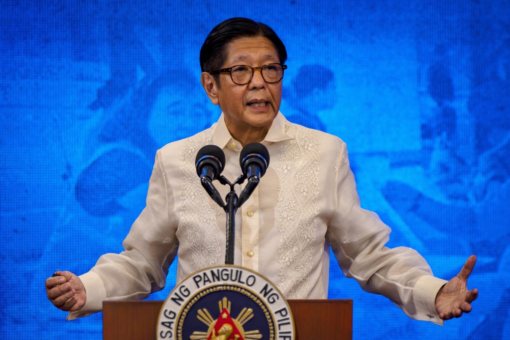Photo by EZRA ACAYAN / POOL / AFP  Philippine President Ferdinand Marcos speaks during a press conference at the Malacanang Palace in Manila on March 25, 2026.