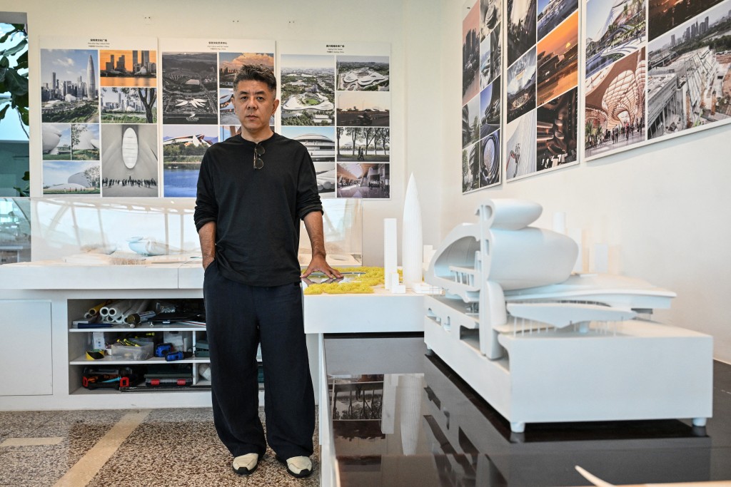 Photo by ADEK BERRY / AFP  Chinese architect and founder of MAD Architects Ma Yansong poses for a photograph in Beijing on August 7, 2026.