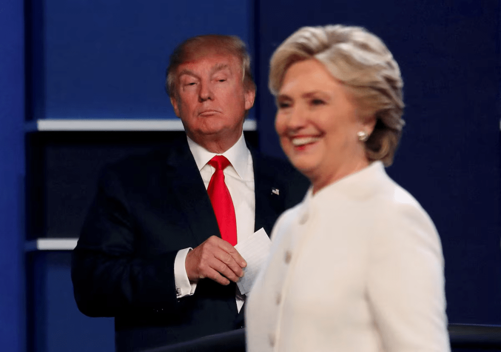 Republican U.S. presidential nominee Donald Trump and Democratic U.S. presidential nominee Hillary Clinton finish their third and final 2016 presidential campaign debate at UNLV in Las Vegas, Nevada, U.S., October 19, 2016. REUTERS/Mike Blake/File Photo