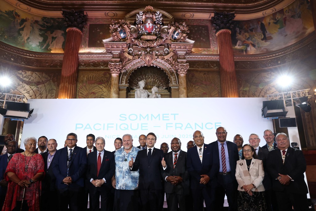French President Emmanuel Macron, Munipoese Muli’aka’aka, President of the Territorial Assembly of Wallis and Futuna, and Moetai Charles Brotherson, President of French Polynesia, pose for a family photo with participants during the France-Pacific Summit at the Prefecture during the third United Nations Ocean Conference (UNOC3) that gathers leaders, researchers and activists to discuss how to protect marine life in Nice, France, June 10, 2025. (Reuters)