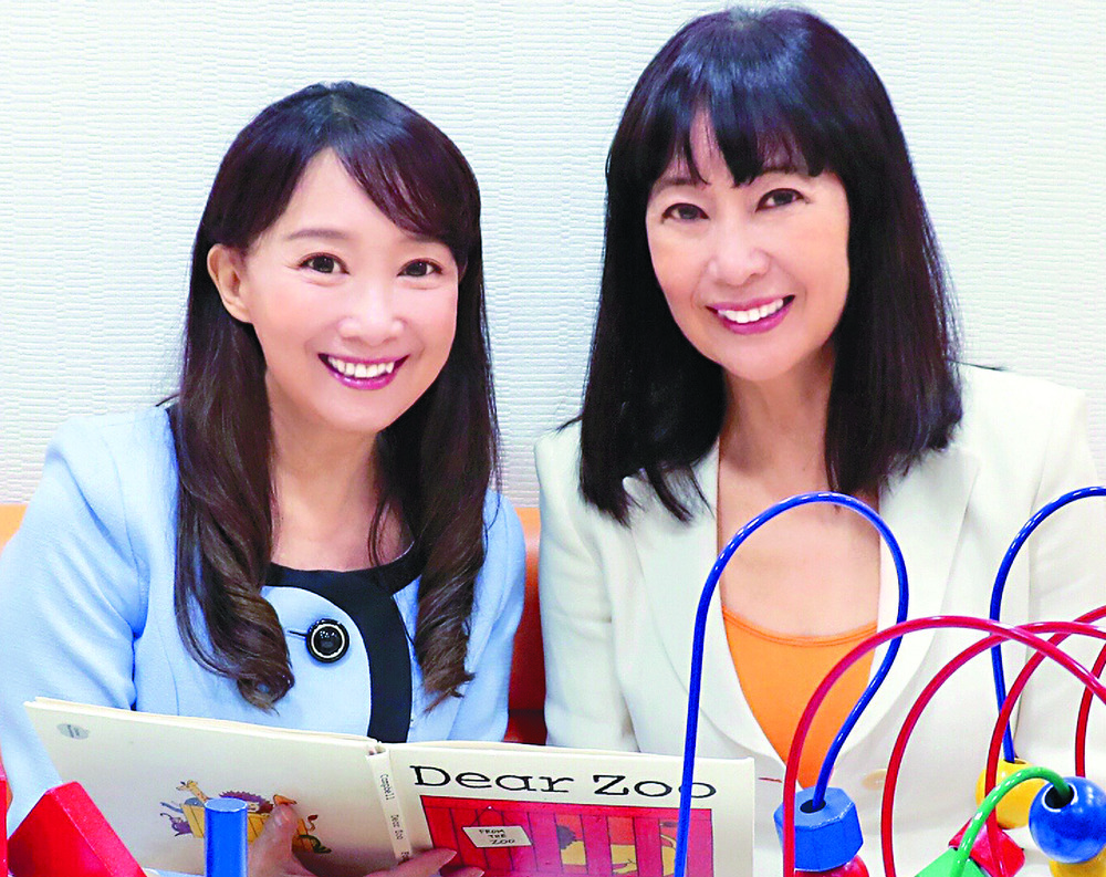 Agnes Chan, near right, with sister Helen Chan. Agnes Chan, near right, with sister Helen Chan.