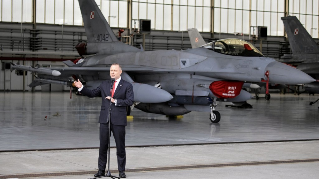 Polish President Karol Nawrocki visits air base the day after violations of Polish airspace by Russia. (Reuters)