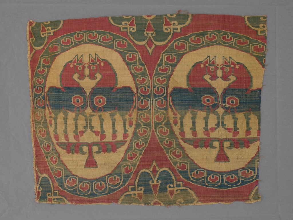Piece with a pair of facing horses in roundels Tang dynasty, 8th to 9th century Weft-faced compound twill (samite), polychrome silk threads The Chris Collection at the Hong Kong Palace Museum, 2025.CH-HKPM.78