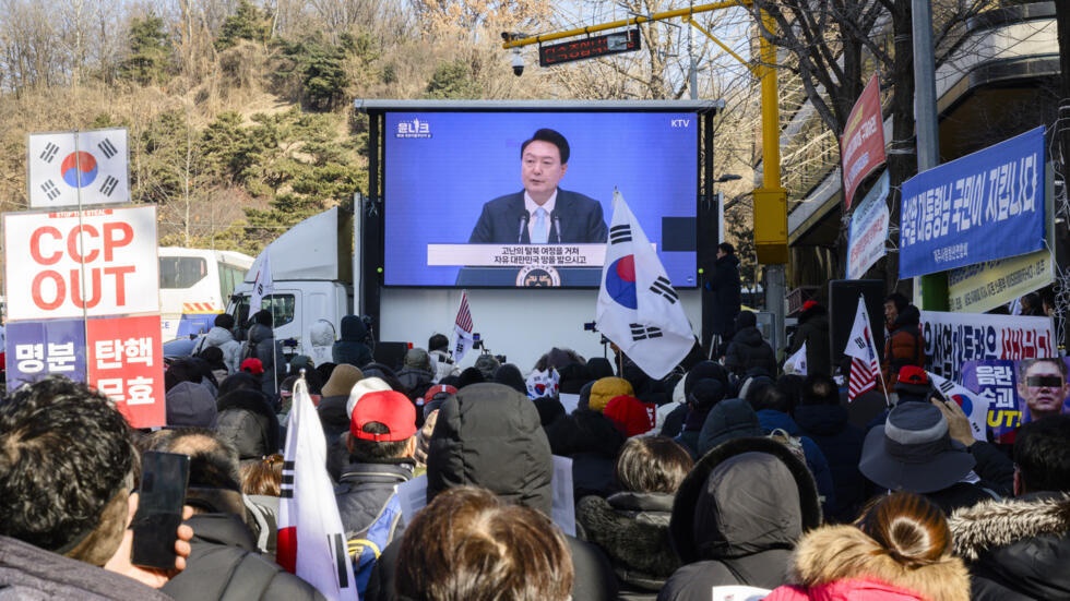 South Korea's ousted President Yoon Suk Yeol on Wednesday became the country's first sitting head of state on trial on criminal charges © ANTHONY WALLACE / AFP South Korea's ousted President Yoon Suk Yeol on Wednesday became the country's first sitting head of state on trial on criminal charges © ANTHONY WALLACE / AFP