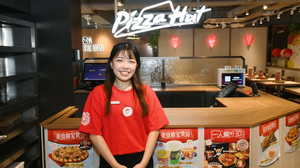 Cynthia Wong has been a part-time waitress at Pizza Hut for eight years, taking great pride in being able to integrate her langu