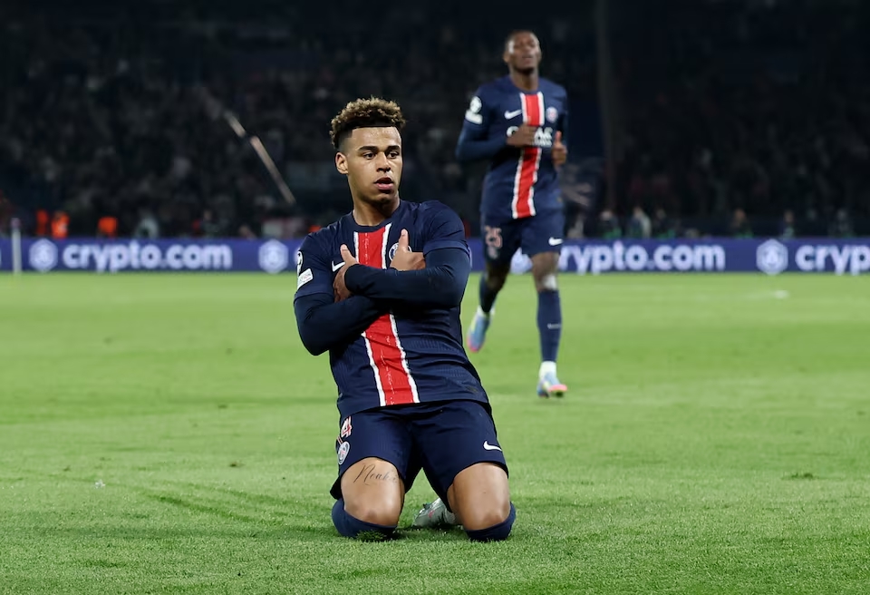 Paris St Germain's Desire Doue celebrates scoring their first goal. (Reuters)