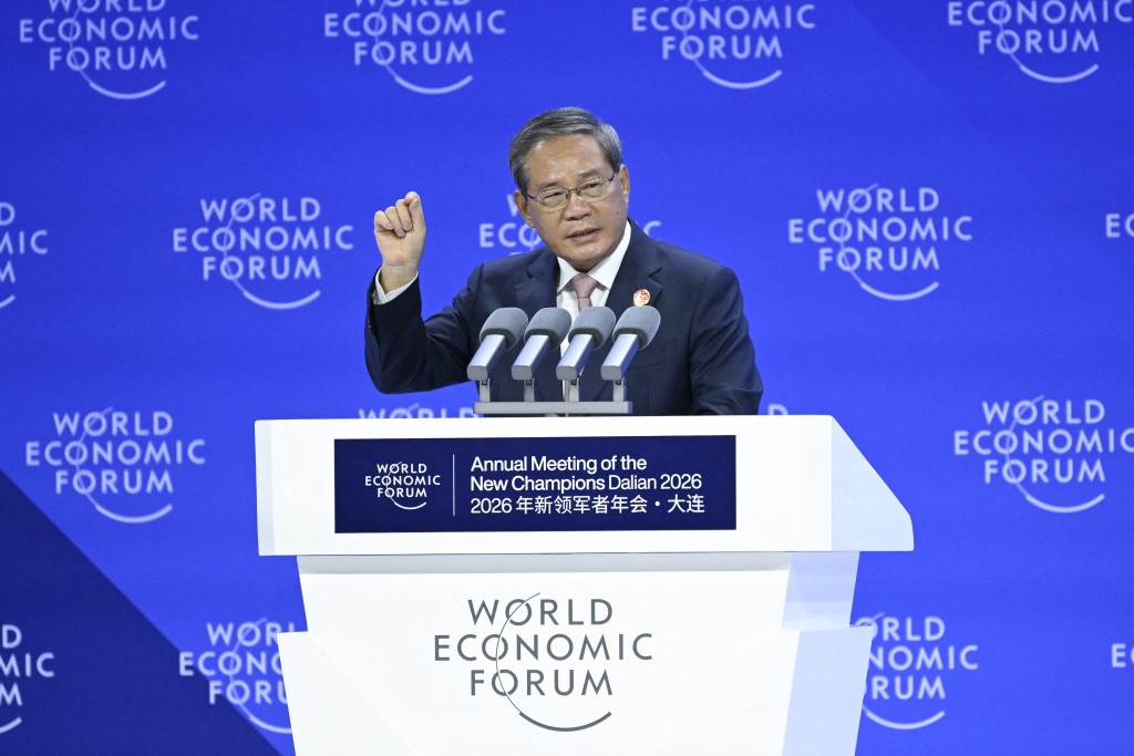 Chinese Premier Li Qiang delivers his speech at the opening ceremony of the World Economic Forum (WEF) in Dalian, China's Liaoning province on June 24, 2026. (Photo by WANG Zhao / AFP)