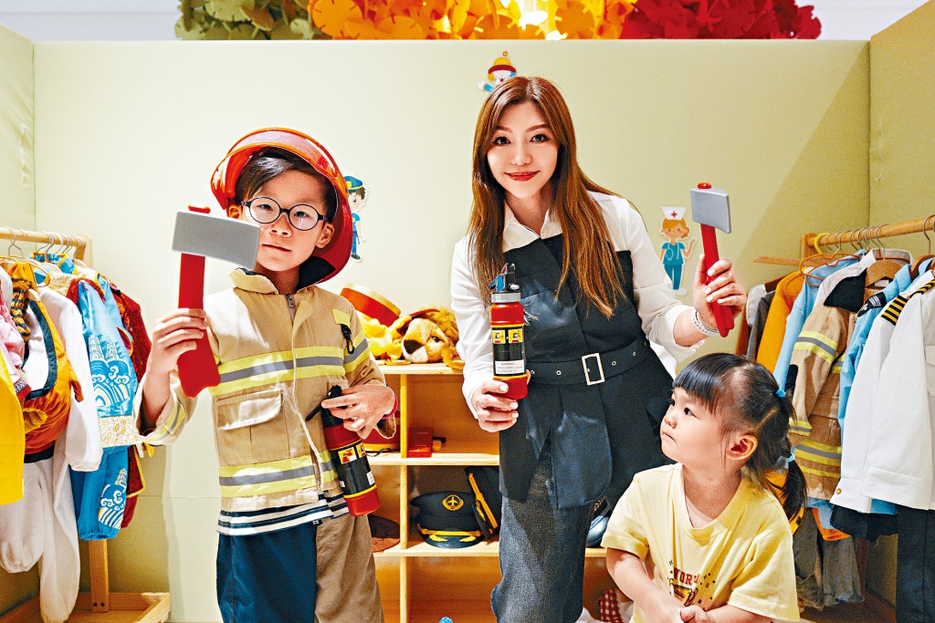 Carmen Choi, center, says the programming focus for primary school education is to encourage students to think outside the box.