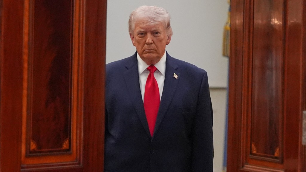 U.S. President Donald Trump arrives to address the nation from the Cross Hall of the White House on April 1, 2026 in Washington, DC. Trump used the prime-time address to update the nation on the war in Iran. Alex Brandon-Pool/Getty Images/AFP
