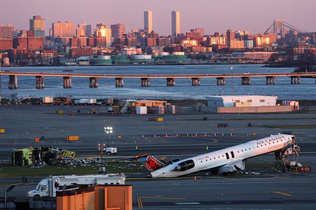 The wreckage of an Air Canada Express jet that collided with a ground vehicle on Monday at New York's LaGuardia Airport in Queens, New York, U.S., March 24, 2026. REUTERS/Shannon Stapleton/File Photo 