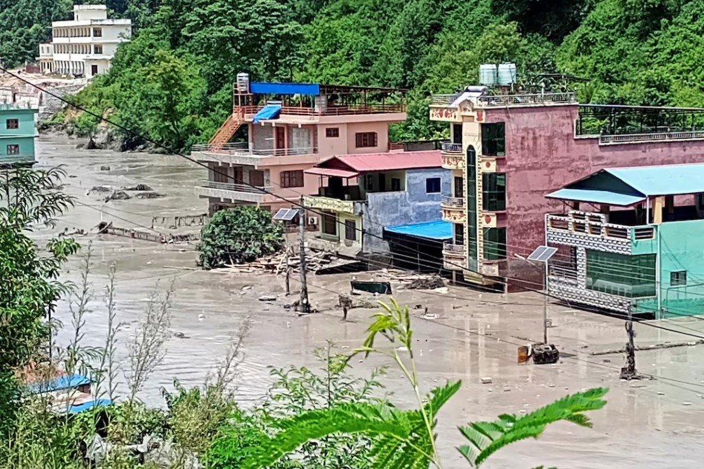  A flooded road following a flash flood in Galchhi in the Dhading district, Nepal, August 26. REUTERS/Stringer
