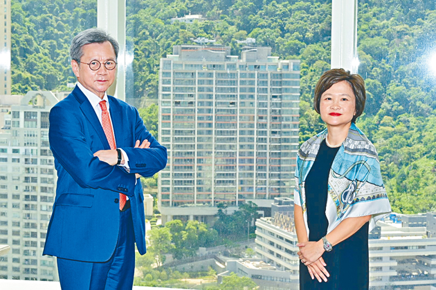 CK Asset's Justin Chiu with the local representative of Sino Suisse Capital Yuen Sze Ling. CK Asset's Justin Chiu with the local representative of Sino Suisse Capital Yuen Sze Ling.