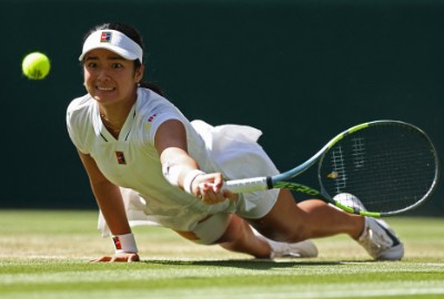 Alexandra Eala stretches to hit a shot against Iga Swiatek. REUTERS
