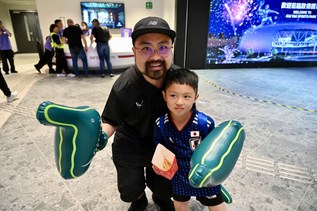 Fan Wong brought his son to the event for the first time, hoping to introduce him to rugby