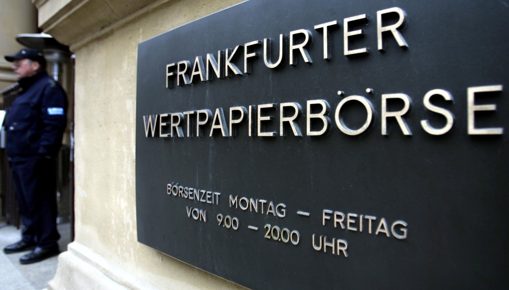A guard secures the entrance of Germany's stock exchange Deutsche Boerse Group in Frankfurt, Germany January 14, 2005. REUTERS/Kao Pfaffenbach/File Photo