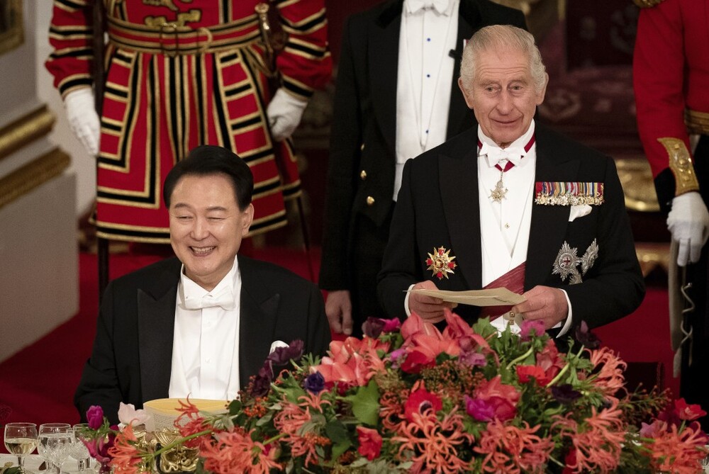 King Charles speaks during the state banquet.