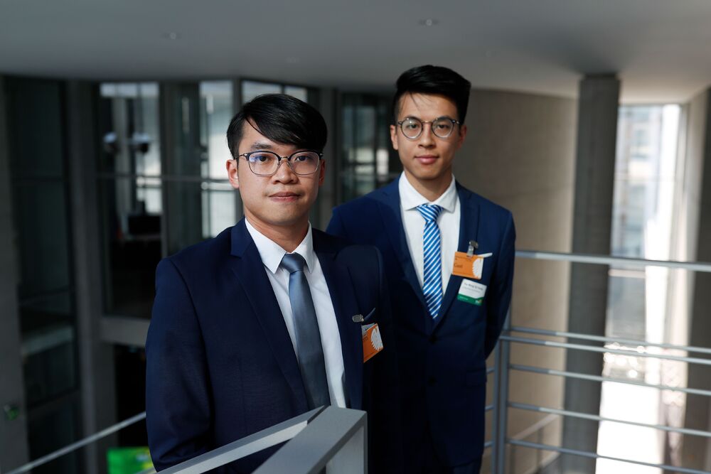 Alan Li, left, and Ray Wong – granted refugee status in Germany in 2018 – are helping Hong Kong activists in exile. AFP Alan Li, left, and Ray Wong – granted refugee status in Germany in 2018 – are helping Hong Kong activists in exile. AFP