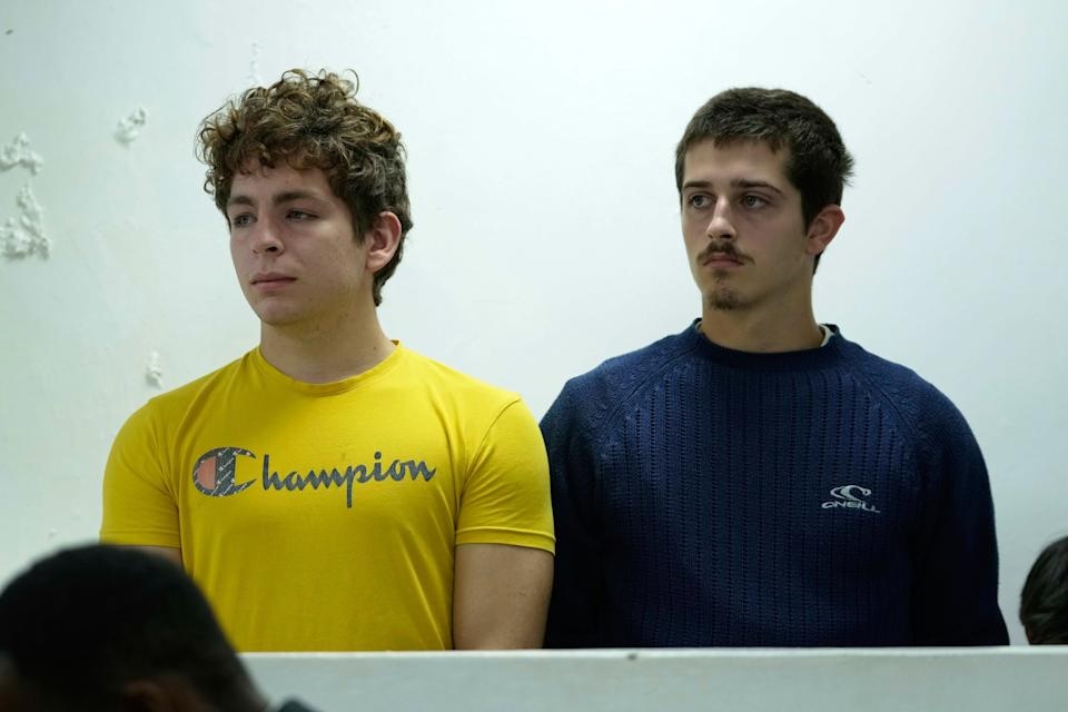 Belgian nationals Lornoy David, left, and Seppe Lodewijckx appear at the Jomo Kenyatta International Airport Law Courts in Nairobi, Kenya Wednesday, May 7, 2025. (AP Photo/Brian Inganga)
