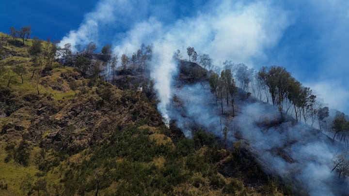 A drone view of smoke rising from Mount Bromo National Park in Probolinggo, East Java, Indonesia, August 6, 2026. REUTERS/Stringer