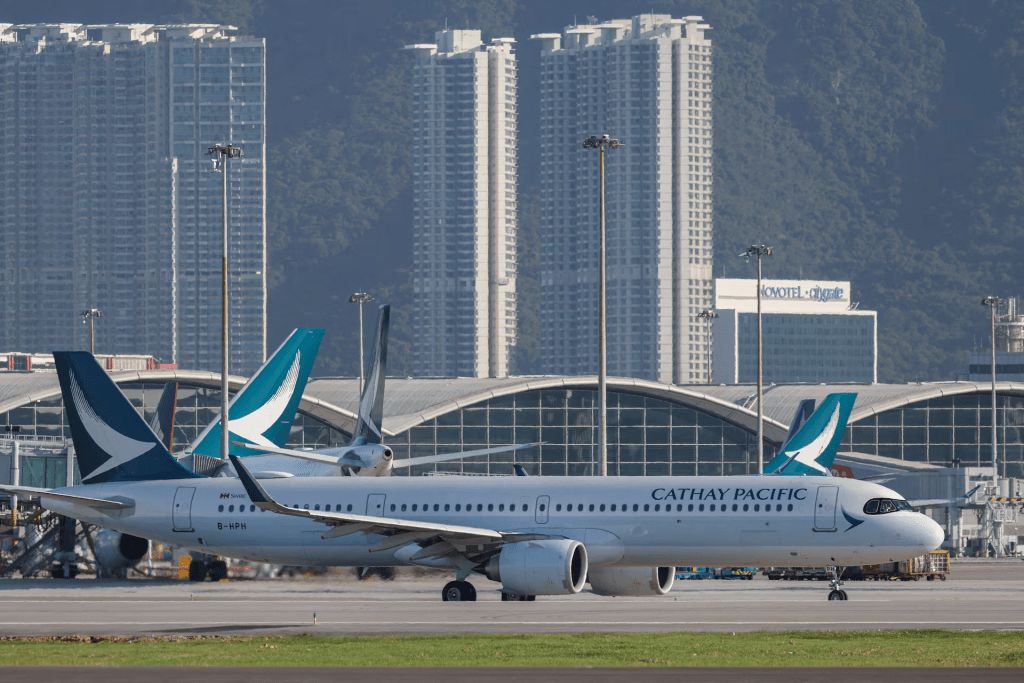 A Cathay Pacific aircraft taxis at Hong Kong International Airport on the day of the official launch of its third runway, in Hong Kong, China November 28, 2024. REUTERS/Tyrone Siu/File Photo 