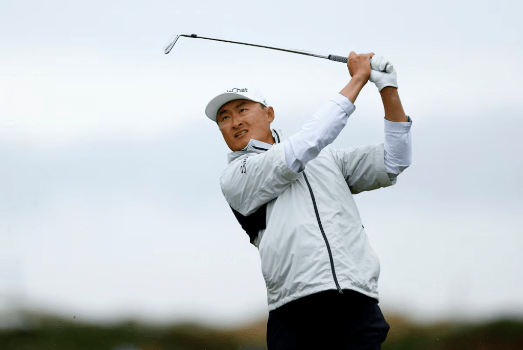 Golf - The 150th Open Championship - Old Course, St Andrews, Scotland, Britain - July 15, 2022 China's Haotong Li tees off on the 11th during the second round REUTERS/Andrew Boyers/File Photo