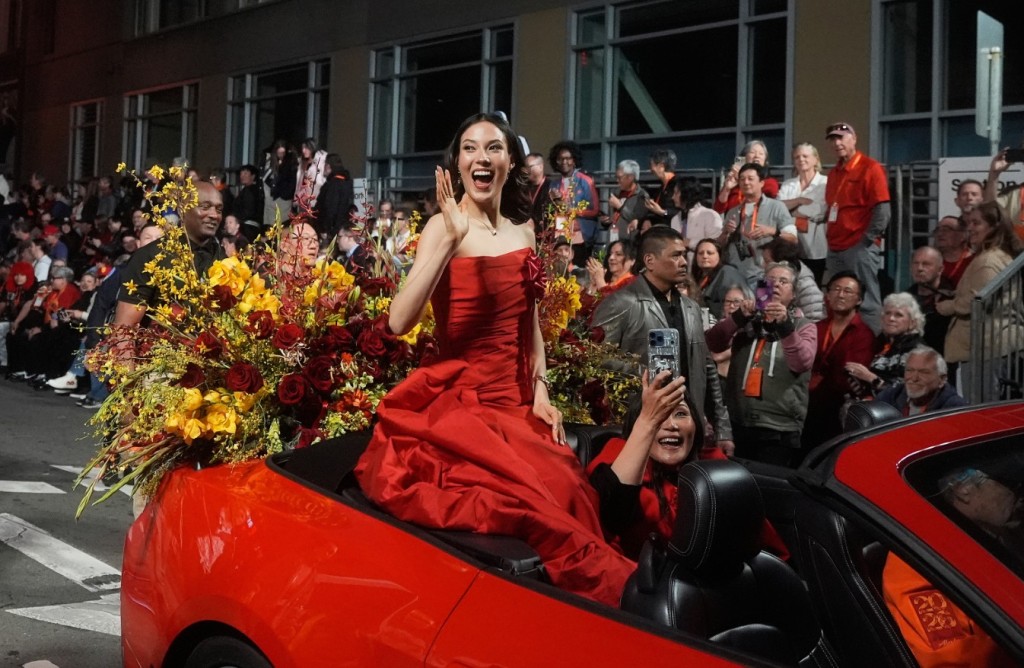 Olympic gold medalist and Grand Marhsal Eileen Gu waves tothe crowd during the Chinese New Year Parade in San Francisco. AP