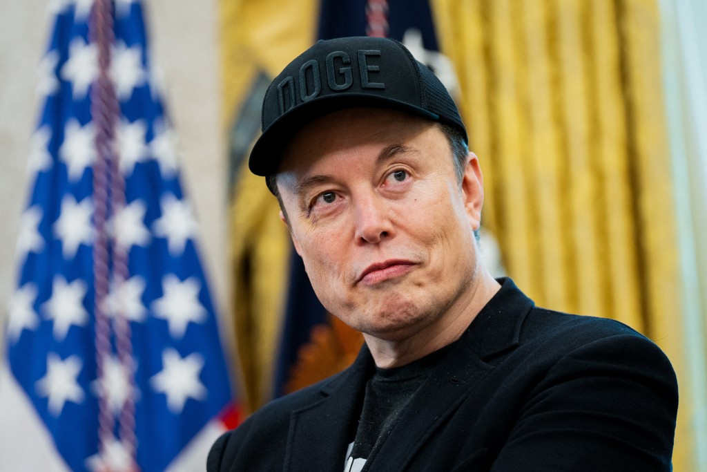 Elon Musk looks on during a news conference with US President Donald Trump in the Oval Office of the White House in Washington, DC, on May 30, 2025.  (Photo by Allison ROBBERT / AFP)