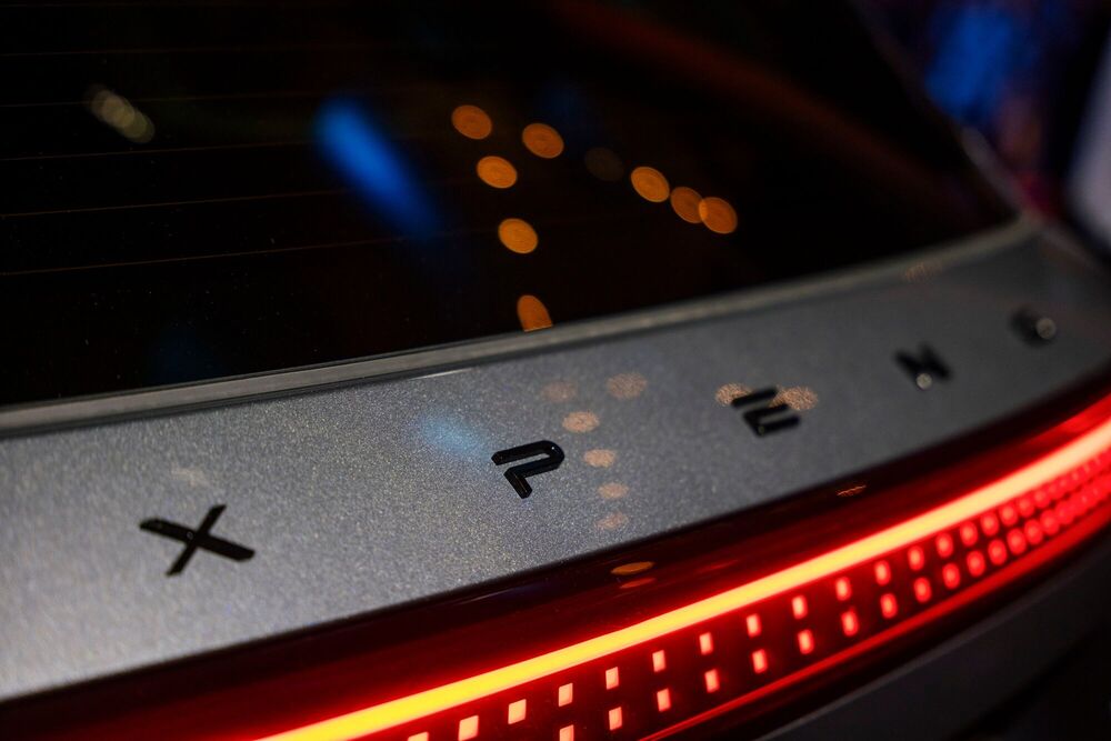 The Xpeng Inc. logo on the company's G9 electric vehicle during an event to mark the launch of Xpeng Inc. sales to the UK market in London, UK, on Tuesday, Feb. 11, 2025. Across Europe, Chinese carmakers held onto 8.2% of the EV market in December, a slight bump up from November but still below the average. Photographer: Jose Sarmento Matos/Bloomberg