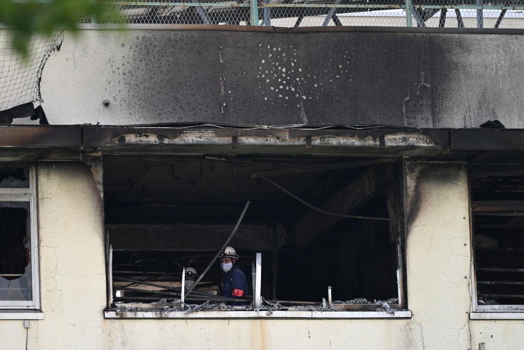 Photo by PHILIP FONG / AFP  Firefighters work at the scene of a fire at an elementary school in Tokyo on June 19, 2026.