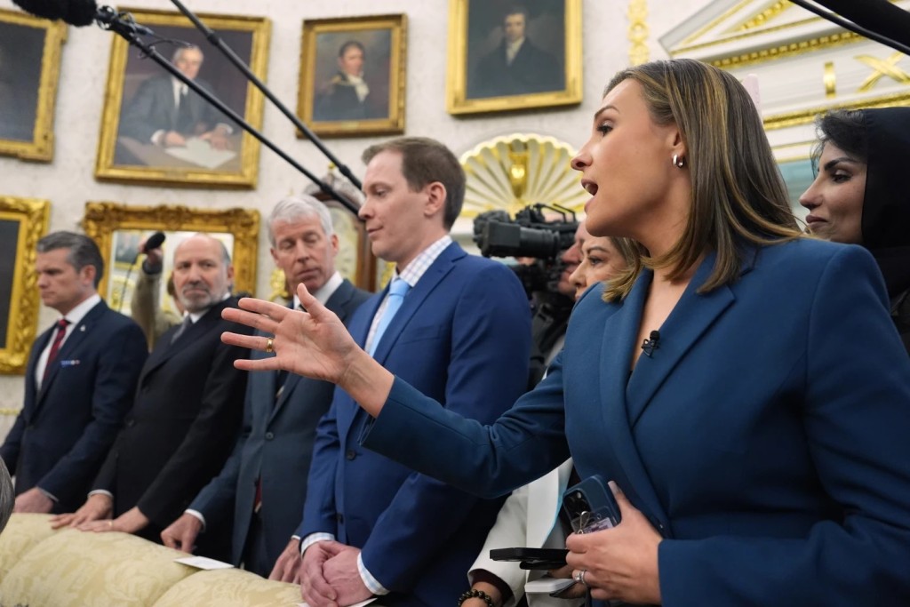 ABC News reporter Mary Bruce as a question as President Donald Trump meets Saudi Arabia’s Crown Prince Mohammed bin Salman in the Oval Office of the White House, Tuesday, Nov. 18, 2025, in Washington. Listening from left are Defense Secretary Pete Hegseth, Commerce Secretary Howard Lutnick and Energy Secretary Chris Wright and David Broomell, Manufacturing Technology Manager at energy equipment manufacturer GE Vernova, listen. (AP Photo/Evan Vucci)