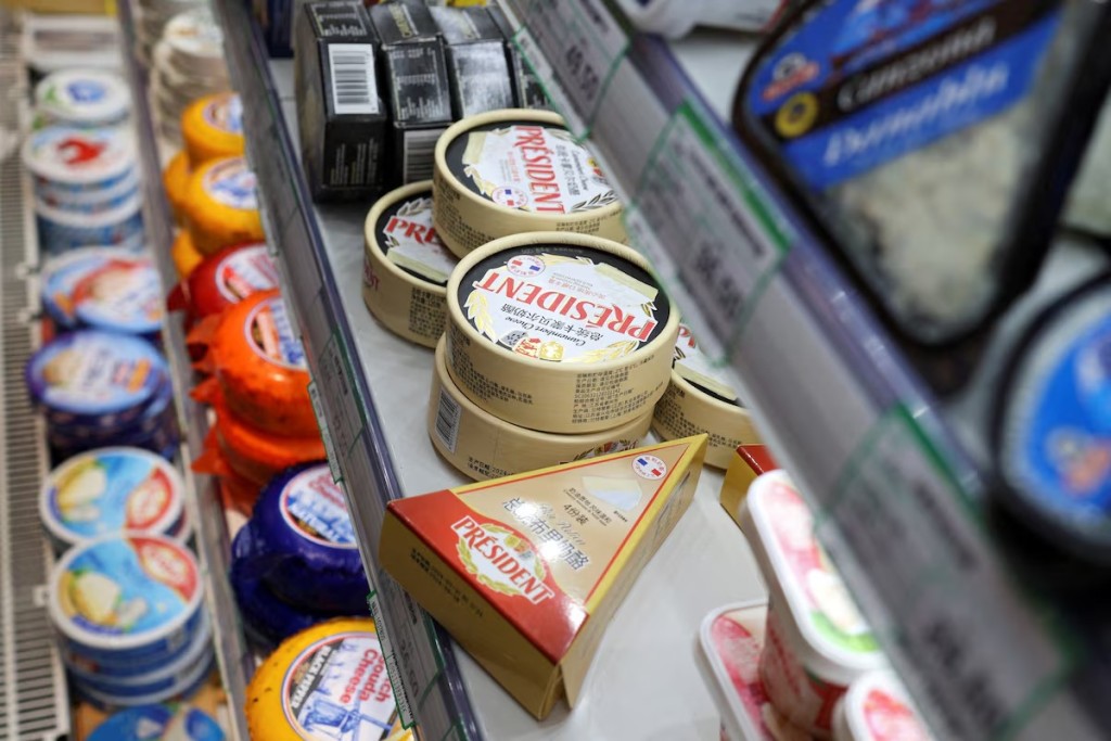 Cheese products are displayed at the dairy section of a supermarket in Beijing, China, August 22, 2024. REUTERS