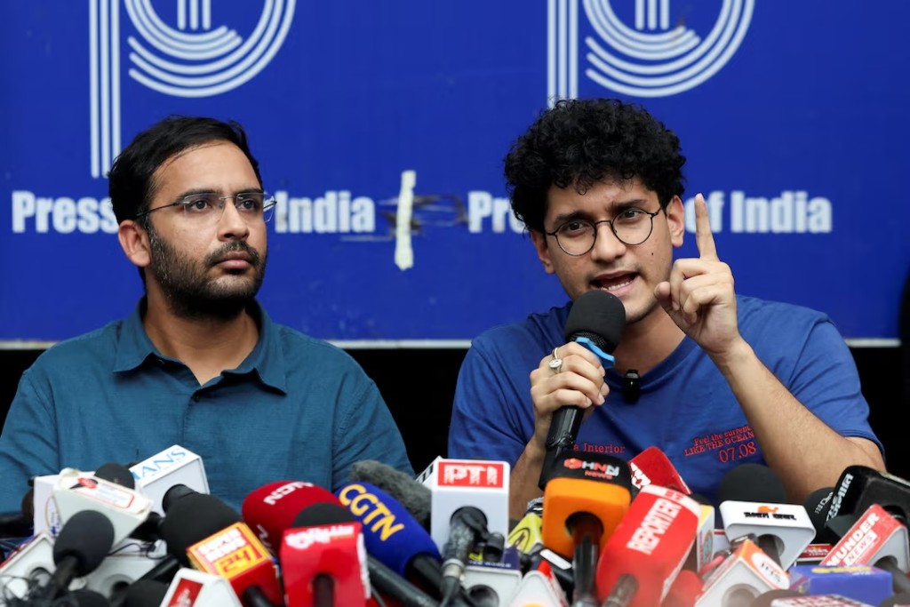 Saurav Das, chief spokesperson of the Cockroach Janta Party (CJP), speaks next to Ashutosh Ranka, co-convenner of CJP, during a press conference at the Press Club of India following their release, amid protests demanding the resignation of India's Chief Election Commissioner Gyanesh Kumar, in New Delhi, India, October 11, 2026. REUTERS/Bhawika Chhabra