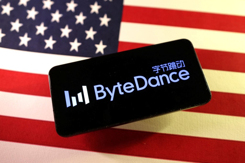 US national flags and Bytedance logo. REUTERS.