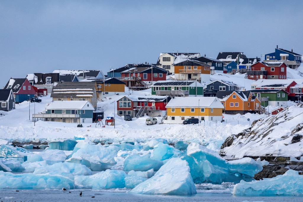 Photo by ODD ANDERSEN / AFP  Icebergs float in the water off Nuuk, Greenland, on March 7, 2025.