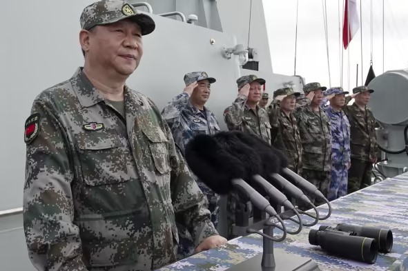 Xi Jinping, China's president, makes a speech on board the destroyer Changsha. (AP) Xi Jinping, China's president, makes a speech on board the destroyer Changsha. (AP)