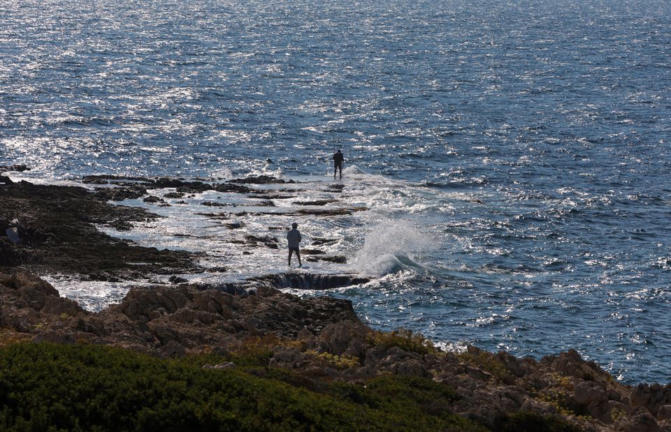 Fishermen catch fish, in Naqoura, near the Lebanese-Israeli border, southern Lebanon. (Reuters) Fishermen catch fish, in Naqoura, near the Lebanese-Israeli border, southern Lebanon. (Reuters)