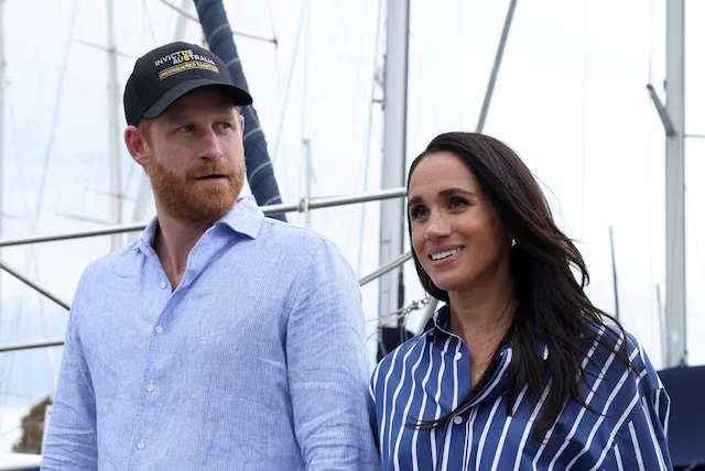 Britain's Prince Harry and Meghan, the Duke and Duchess of Sussex, disembark after sailing on Sydney Harbour with veterans from the Invictus Australia community, in Sydney, Australia, April 17, 2026. REUTERS/Hollie Adams/File Photo