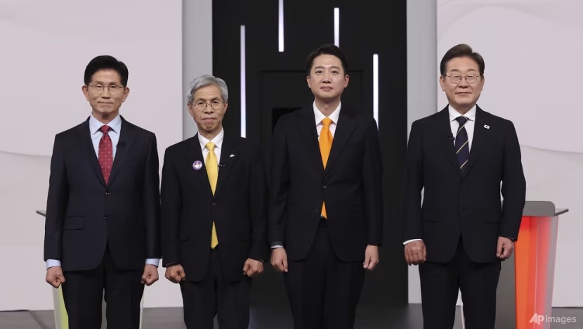 From left to right: South Korea's presidential candidates, Kim Moon Soo of the People Power Party, Kwon Young-guk of the Democratic Labor Party, Lee Jun-seok of the New Reform Party and Lee Jae-myung of the Democratic Party pose ahead of a televised presidential debate at SBS studio in Seoul, on May 18, 2025. (Photo: AP/Chung Sung-Jun)