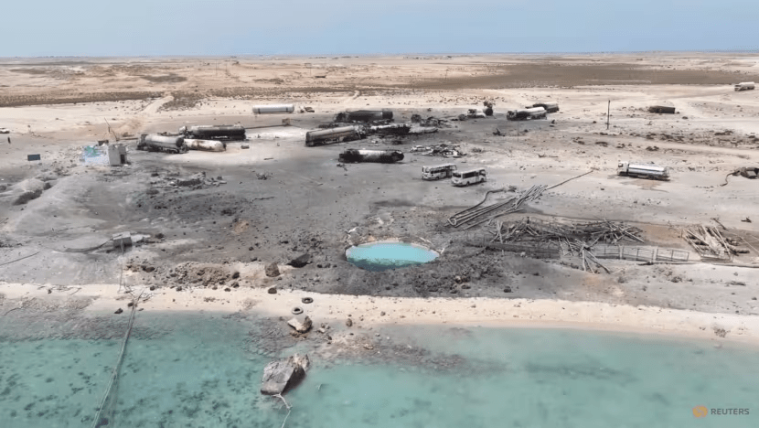 A drone view shows charred vehicles standing in the aftermath of what Al Masirah TV said was a United States strike on the Ras Isa fuel port, Al Jazirah, Yemen, in this screengrab from a handout video released on Apr 18, 2025. (File photo: Handout via Reuters)