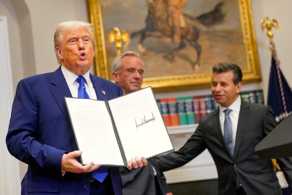 U.S. President Donald Trump holds a signed executive order, as he attends a press conference in the Roosevelt Room at the White House in Washington, D.C., U.S., May 12, 2025. (Reuters)