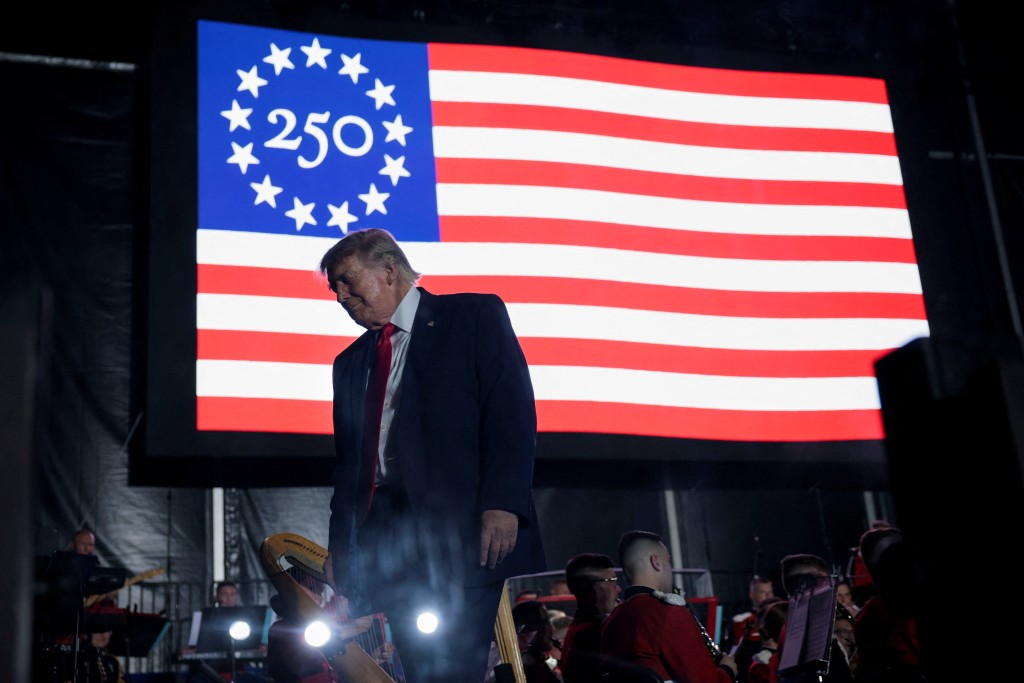 U.S. President Donald Trump walks off stage after speaking at a rally to kick off the Great American State Fair in celebration of the 250th anniversary of U.S. independence on the National Mall in Washington, D.C., U.S., June 24, 2026. REUTERS/Evan Vucci