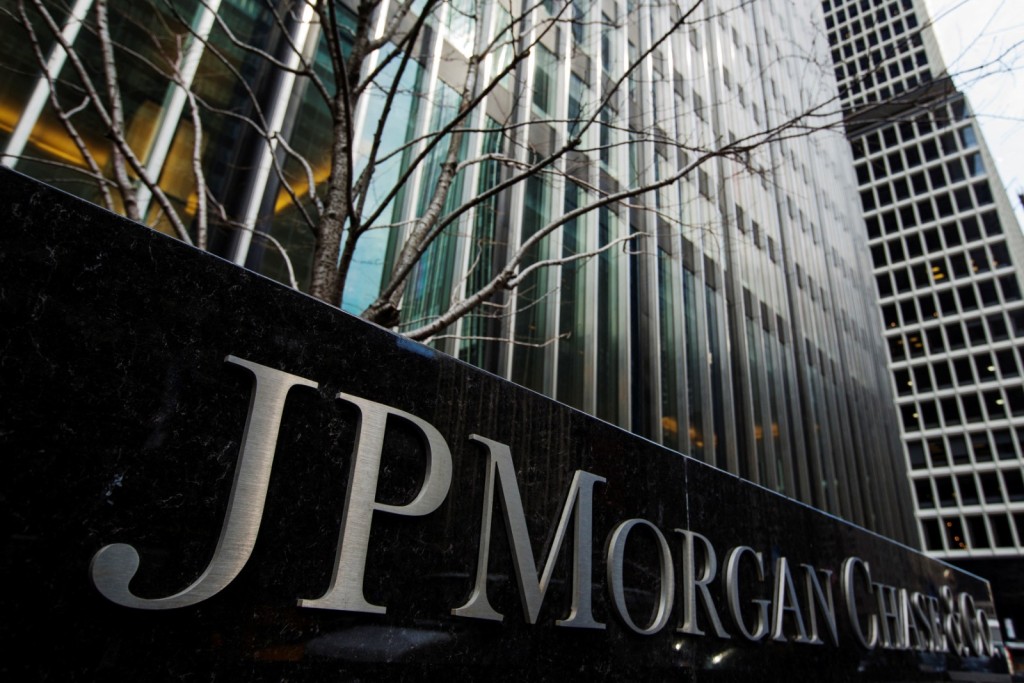 A sign stands in front of the JPMorgan Chase & Co bank headquarters building in New York, March 15, 2013. Reuters